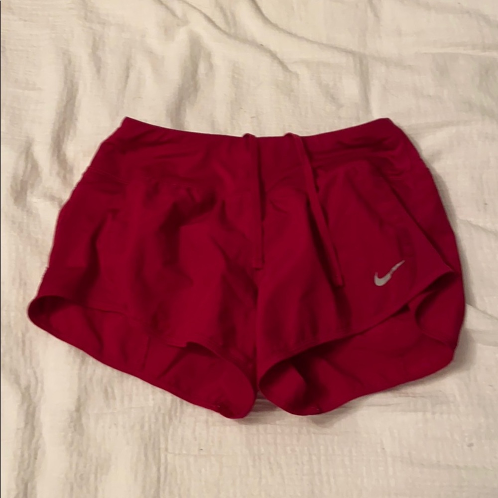 Red nike shorts